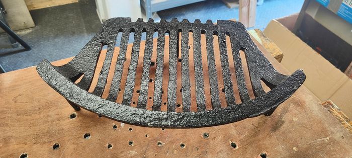 Fire front and grate