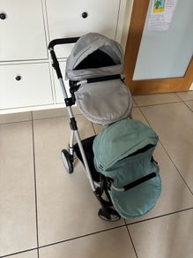 Double pram and twin dolls