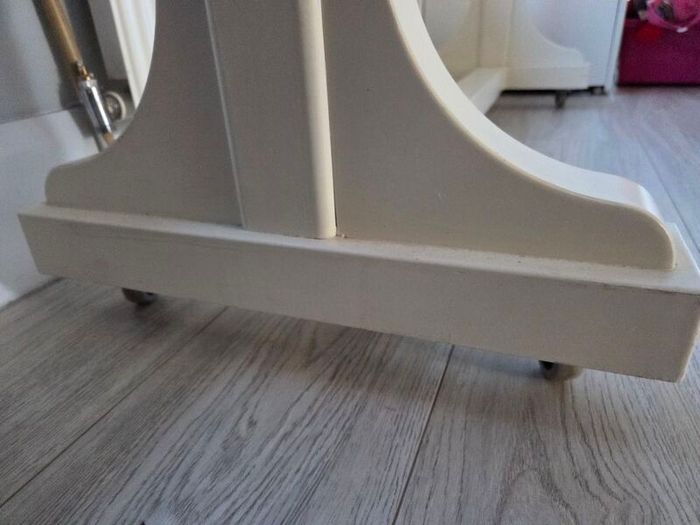 Clothing Rail On Wheels.  Cream wooden clothing Rail with metal hanging pole on wheels.  60e each or 2 for 100e   Height - 64 in  Width - 45 in  Depth - 17 in
