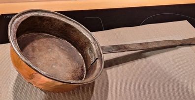 Antique copper pot with handle