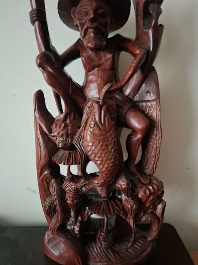 Hand carved wooden Balinese sculpture Fisherman