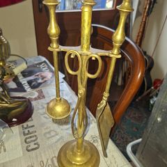 A Vintage Brass Fireplace Companion set, a Brush, Tongs, Shovel and Poker suspended on a stand, Postage available or Collection