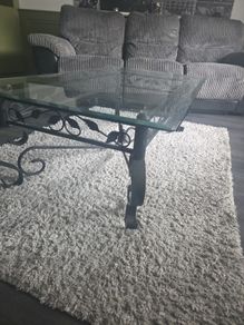 Coffee table - glass top with iron base