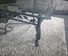 Coffee table - glass top with iron base