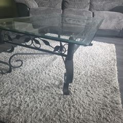 Coffee table - glass top with iron base