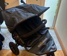 Double Out and About Buggy with Raincover + Storksak Stroller Organiser + pair buggy bag clip attachments + hand warmer