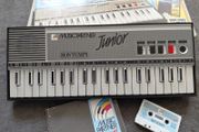 vintage Bontempi junior keyboard with cassette in box