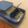 Corgi. Chevrolet Corvair . Rear engine detail, opening engine cover. Image 4