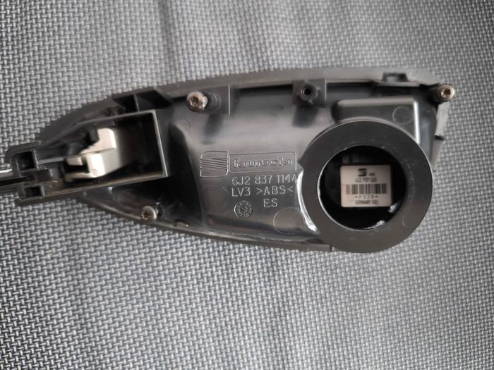 Door Handle Seat Ibiza 6J Driver Side RHD 6J2837114A Description: Genuine Seat Ibiza 6J interior door handle Part number: 6J2 837 114 A Removed from a 2012 Seat Ibiza For right-hand drive vehicles Right driver side Includes mirror adjustment switch surrou