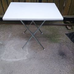 Camping table. Folds flat.
