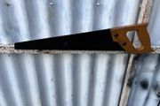 vintage wooden handled carpenters saw