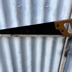 vintage wooden handled carpenters saw