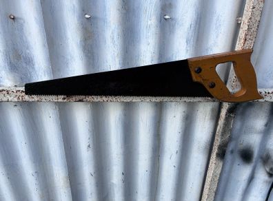 vintage wooden handled carpenters saw