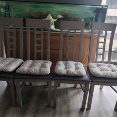 Wooden dining chairs with cushions