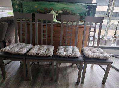 Wooden dining chairs with cushions