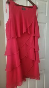 Plus size wedding  guest  dress in coral .