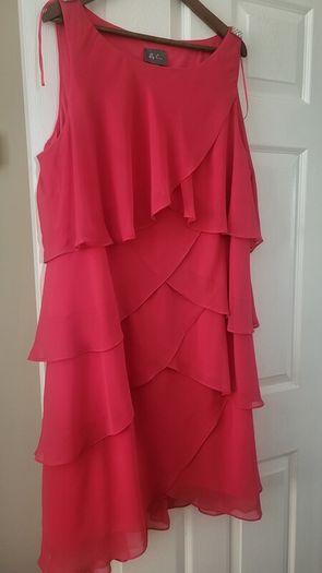 Plus size wedding  guest  dress in coral .