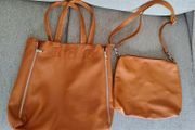 Large Tote Handbag new with smaller inner bag with adjustable and interchangeable shoulder strap in excellent condition with no issues and new and never used FREE STANDARD POSTAGE INCLUDED