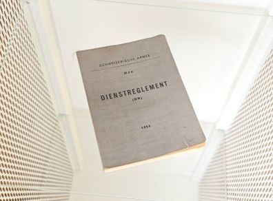 Vintage 1954 Swiss Army service regulation book, known as the Dienstreglement Collectable Militaria