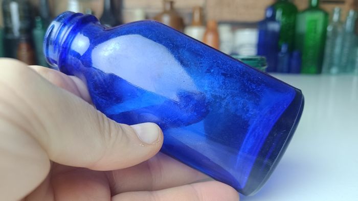463 - Set of Three Beautiful Vintage Glass Decorative Collectible Bottles - Amber Eire Bovril, Cobalt Blue Magnesia and Turquoise Science Cream