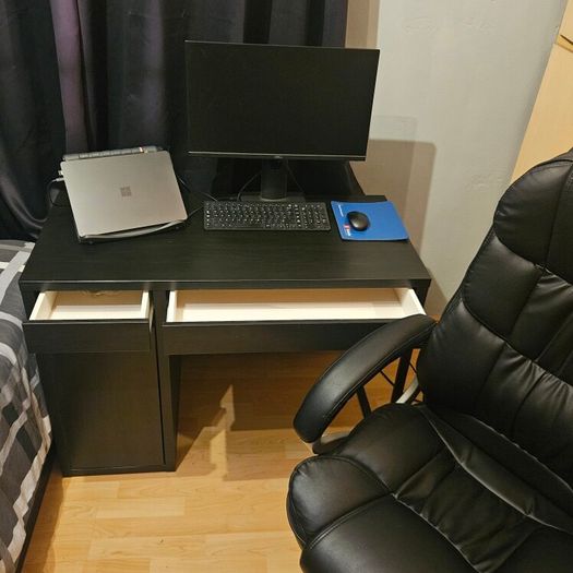 Desk with leather office chair
