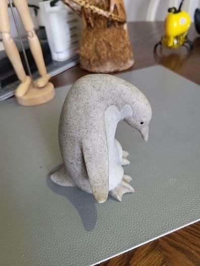 Penguin carved stone