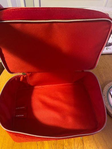 Wicked and Estee Lauder Make Up Bags