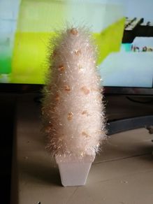 miniature white Christmas tree