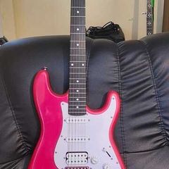 Red strat guitar