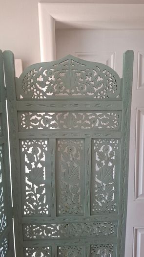 Carved wooden room divider