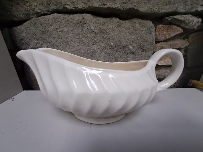 Large ivory gravy jug