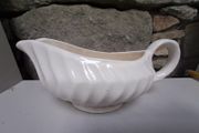 Large ivory gravy jug