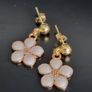 Gold plated pin earrings with enamel flowers pendants Image 3