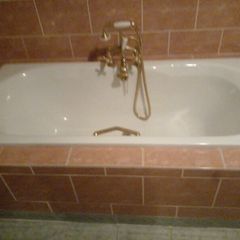 Castiron Bath and sink with fixtures