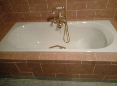 Castiron Bath and sink with fixtures