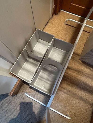 Clothing rail, hangers and storage boxes