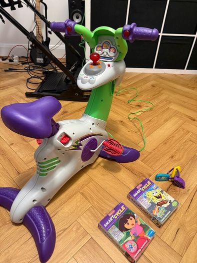 Kids bicycle-game console Fisherprice smart cycle with 3 cartridges
