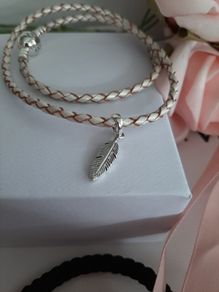New genuine pandora leather bracelet and genuine pandora feather charm