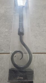 unused black iron curtain rail
