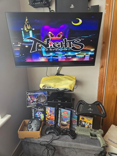 Sega Saturn w/ 3D Control Pad, Arcade Racer, Lightgun and Games