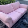 Large pink 2 seater sofa also large purple foot stool Image 2