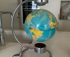 Magnetic revolving globe