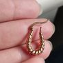 Hoop earrings made of 925 sterling silver with gold plating. Image 2