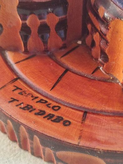 storage water well souvenirs of carved wood marked templo tibidabo from Spain