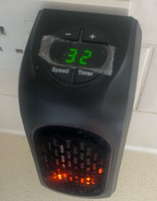 Handy Heater - Compact Plug In Heater