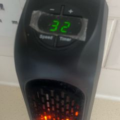 Handy Heater - Compact Plug In Heater