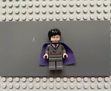 lego harry potter hp051 Harry Potter minifigure - Gryffindor Stripe Torso, Dark Bluish Gray Legs, Lilac Cape