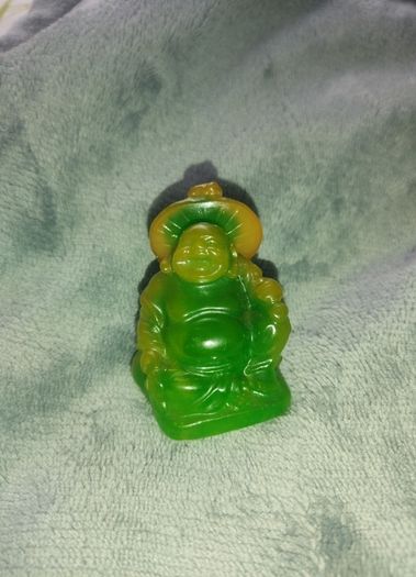 two inch high green Buddha