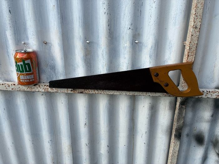 vintage wooden handled carpenters saw