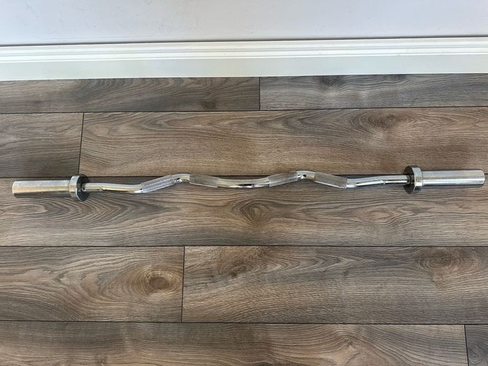 Home Gym Equipment: Adjustable Weider Gym Bench, Olympic bars, and Rubber Weights
